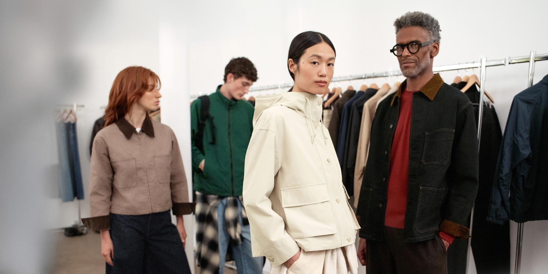 Uniqlo store interior with models in autumn outerwear