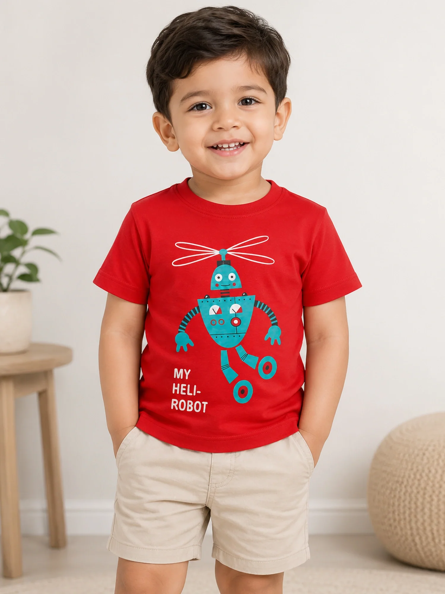 Child wearing a Bodycare red printed kidswear t-shirt