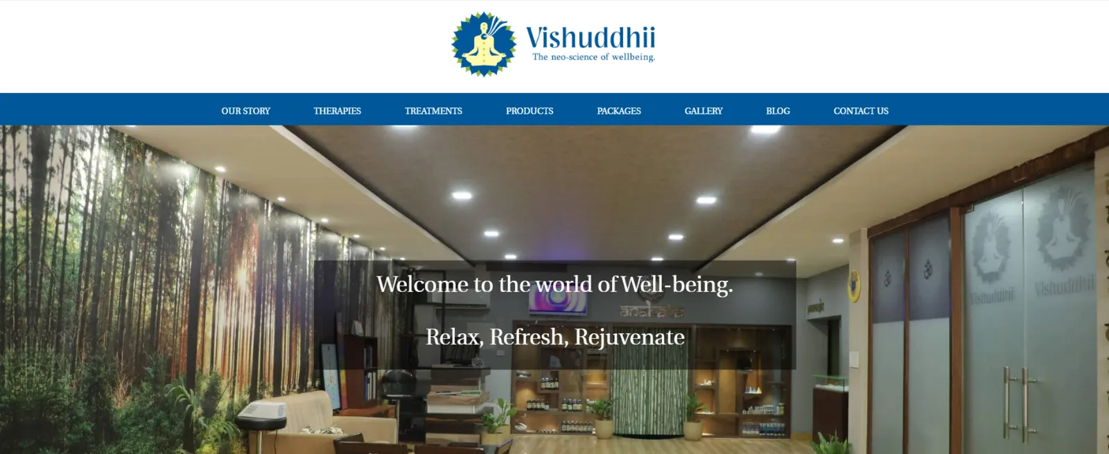 Vishuddhii website homepage with the logo, navigation and a photo of the wellness center reception