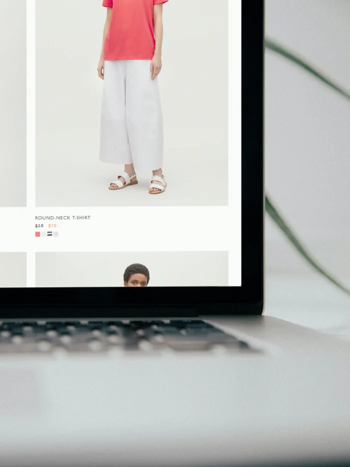 Shopify fashion e-commerce website product page on a laptop
